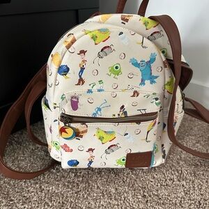 Loungefly Cream and Brown Cartoon Character Backpack